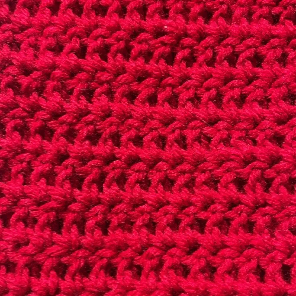 Hand knitted bottle cover